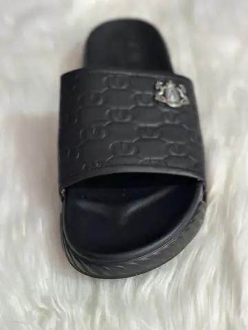 Men's Black Monogram Embossed Leather Slides with Crest Accent